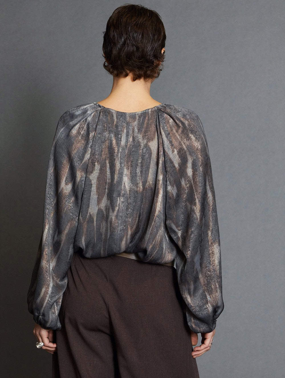 Blusa effetto iridescente